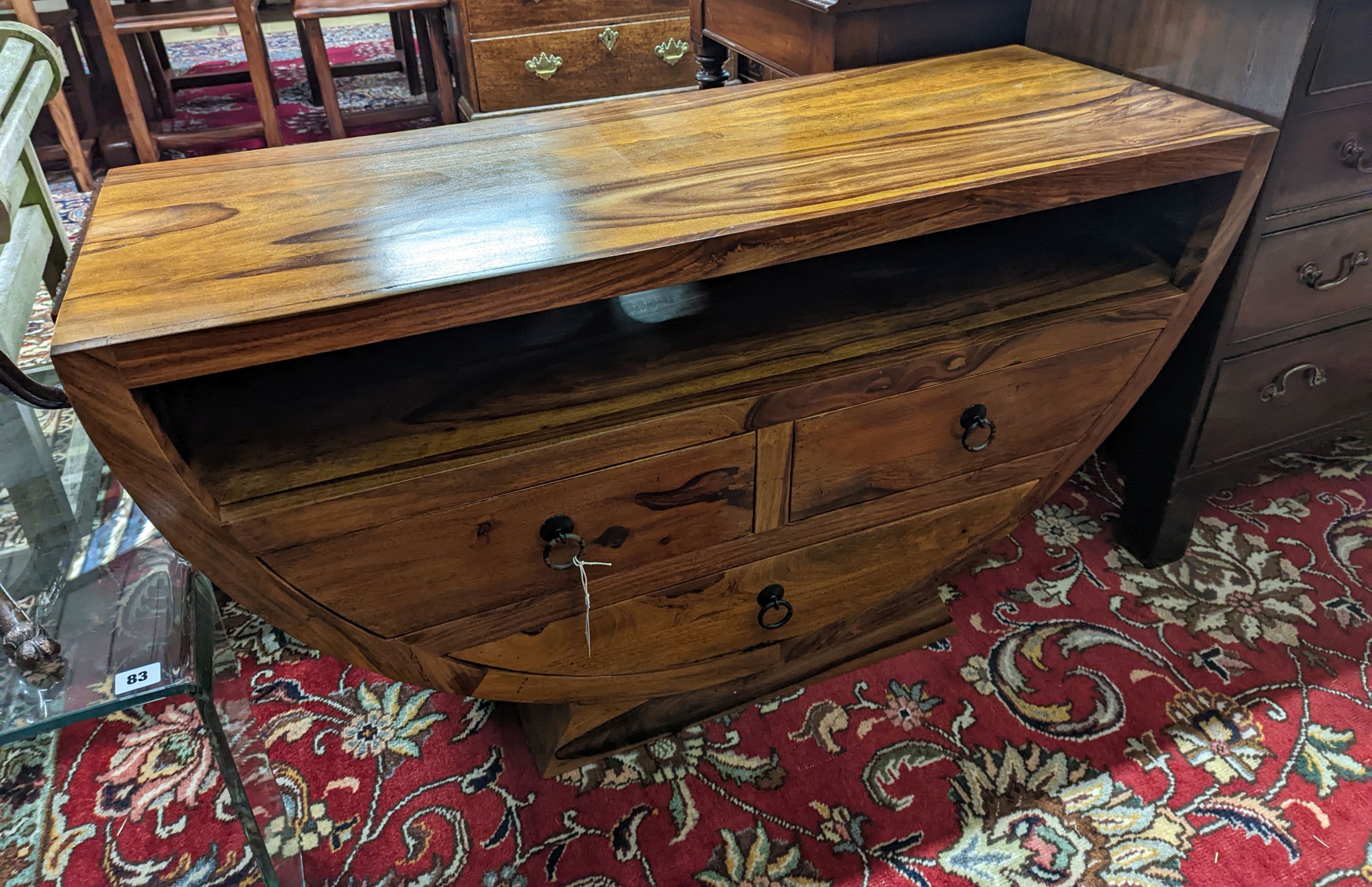 A modern sheesham three drawer 'U' shaped TV unit, width 120cm, depth 45cm, height 66cm